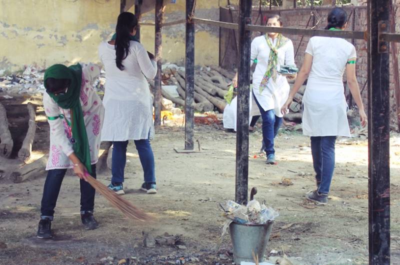 Young brigade of nature conservators brought forth the import of cleaning the surroundings