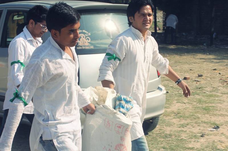 Young brigade of nature conservators brought forth the import of cleaning the surroundings